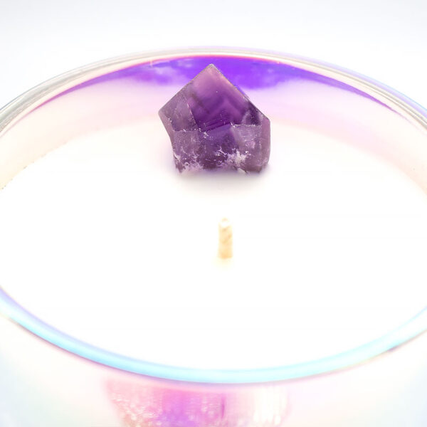 Dog tooth amethyst candle in a holographic glass container